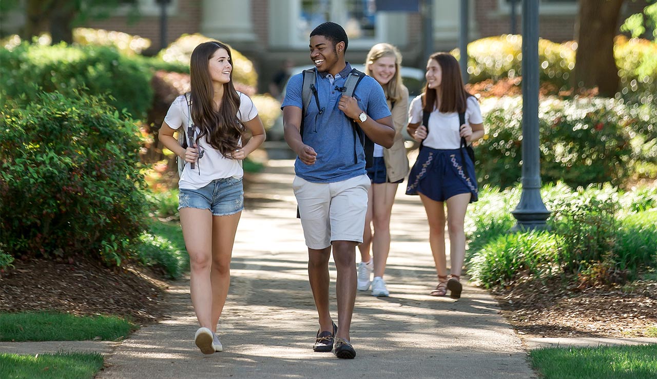 Photo of Students walking along MC