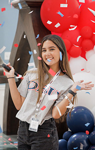dbu student ringing the liberty bell